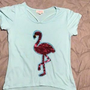 A baby blue flip sequin girls flamingo shirt